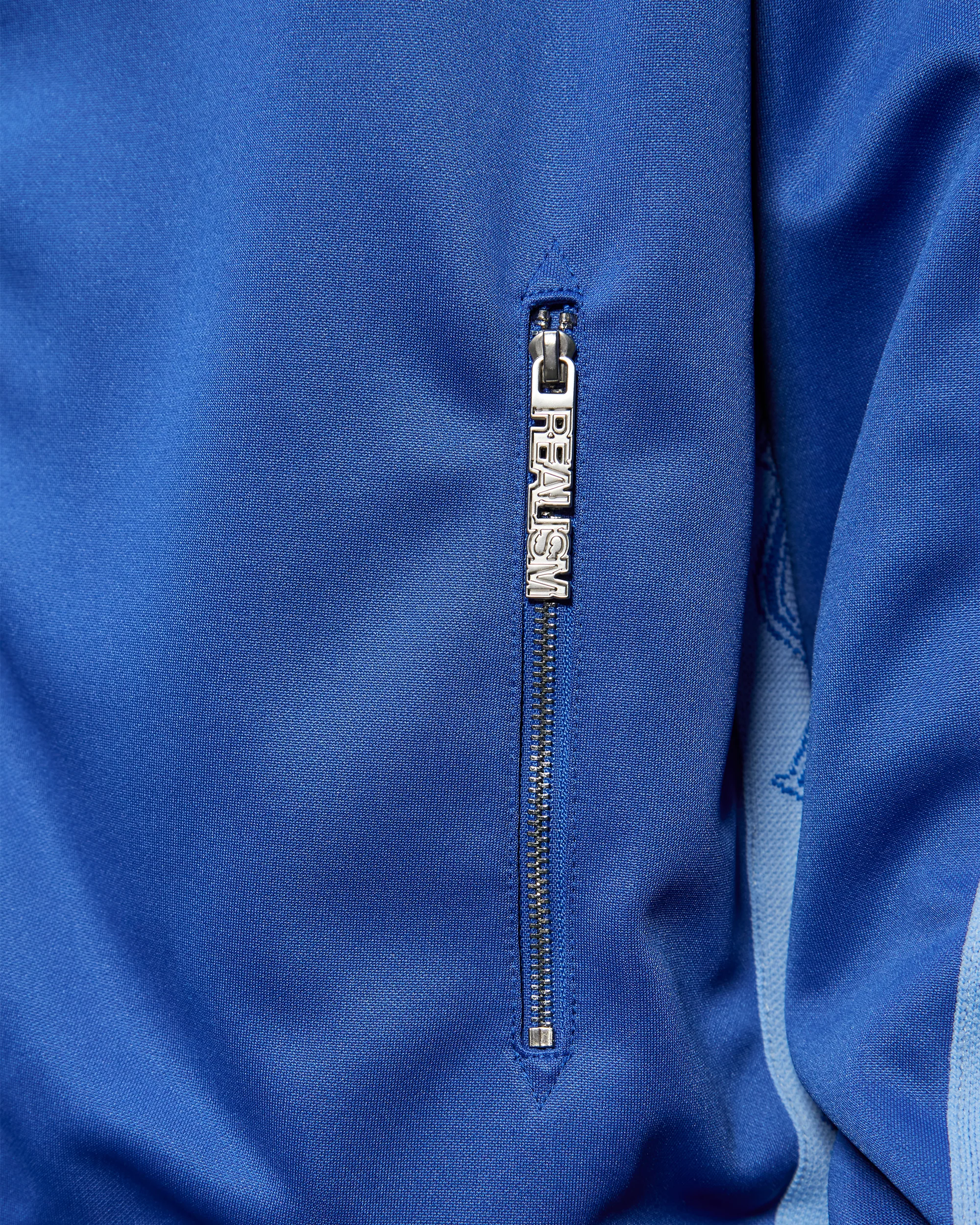 REALISM X UNDERRATED RUN LINE TRACK JACKET BLUE - Image 9